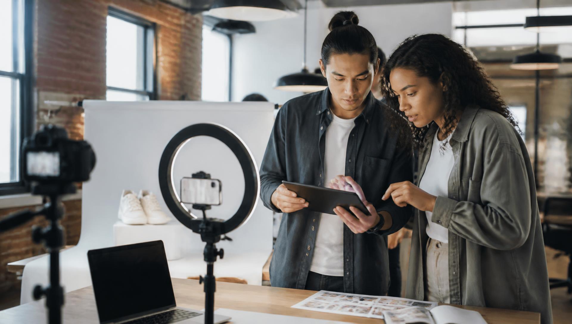 Content creators shooting social media product content in a studio